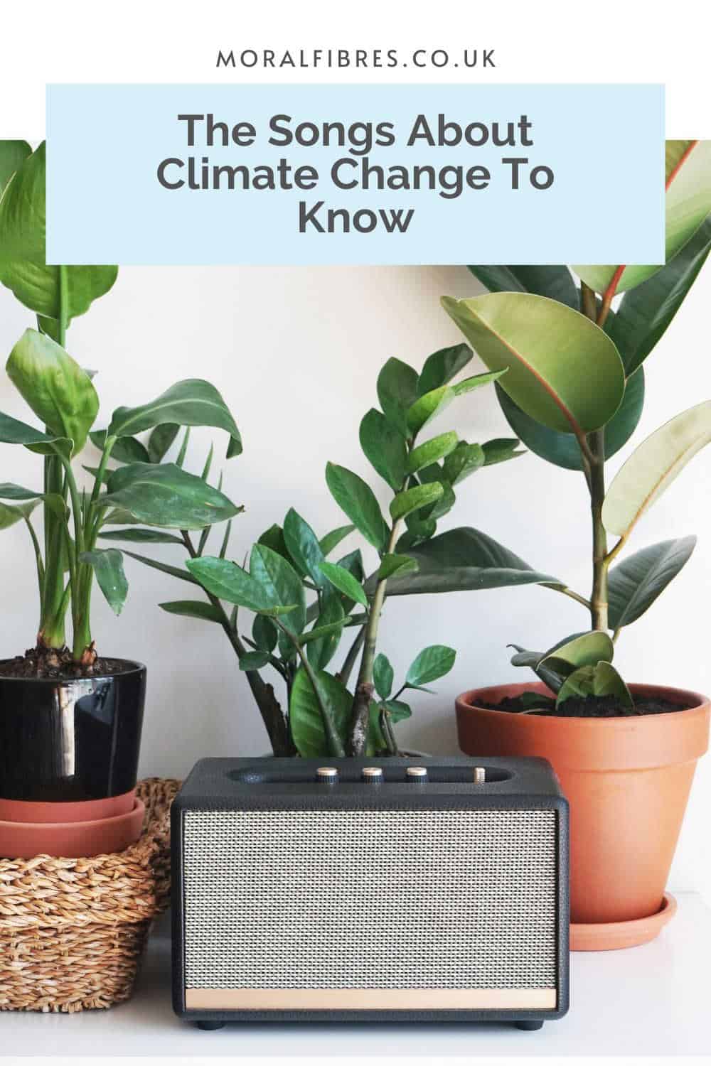 Music speaker on a white table next o a selection of plants, with a blue text box that reads the songs about climate change to know.